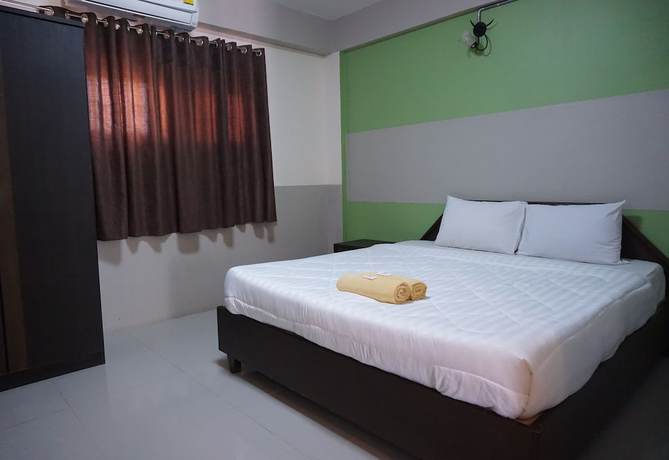 Imagen de la habitación del Hotel Puangpech. Foto 9