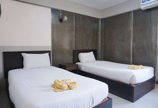 Imagen de la habitación del Hotel Puangpech. Foto 10