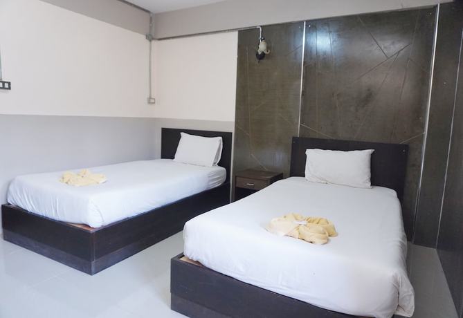 Imagen de la habitación del Hotel Puangpech. Foto 11
