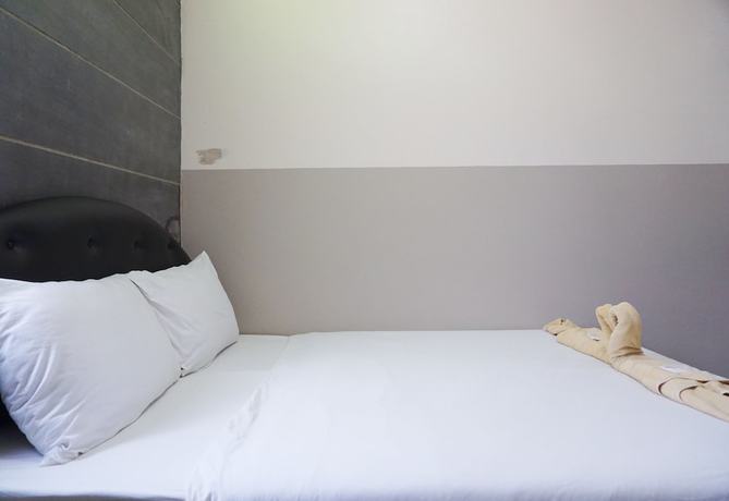 Imagen de la habitación del Hotel Puangpech. Foto 12