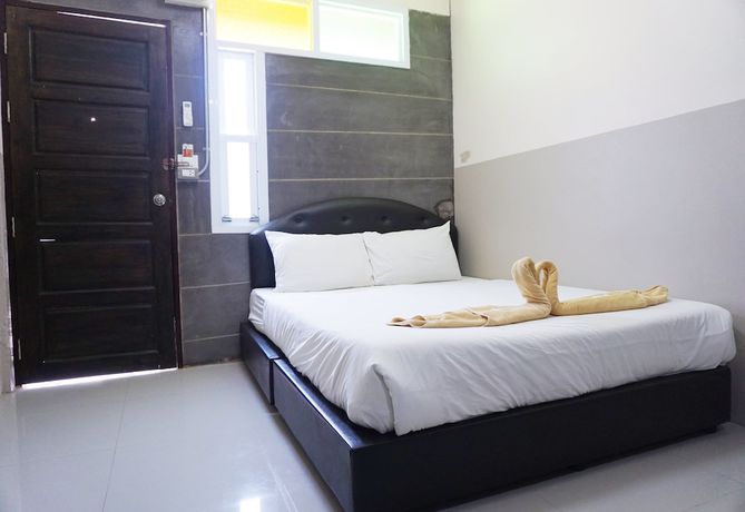 Imagen de la habitación del Hotel Puangpech. Foto 14
