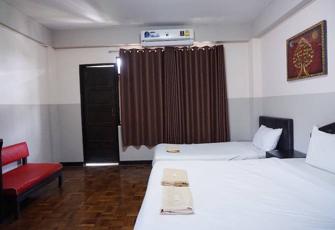 Imagen de la habitación del Hotel Puangpech. Foto 16