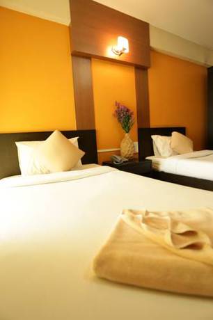 Imagen de la habitación del Hotel Puangpech Place. Foto 4