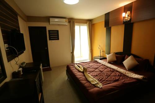 Imagen de la habitación del Hotel Puangpech Place. Foto 6