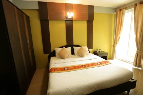 Imagen de la habitación del Hotel Puangpech Place. Foto 7