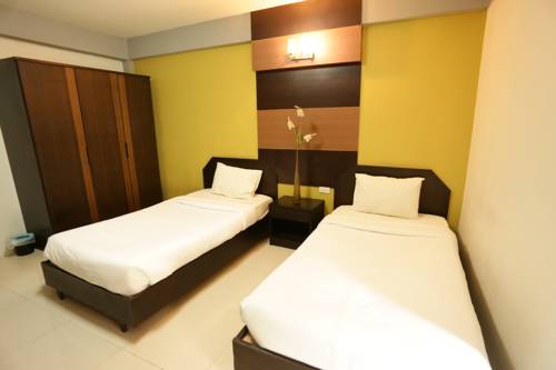 Imagen de la habitación del Hotel Puangpech Place. Foto 8