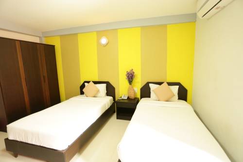 Imagen de la habitación del Hotel Puangpech Place. Foto 10