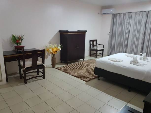 Imagen de la habitación del Hotel Puataukanave International. Foto 12