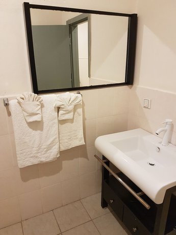 Imagen de la habitación del Hotel Puataukanave International. Foto 13