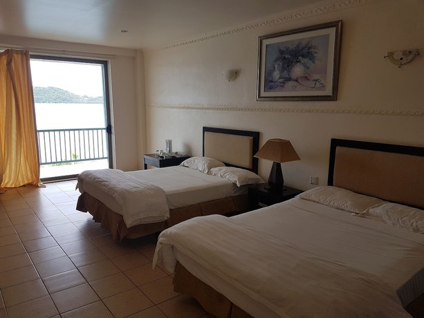 Imagen de la habitación del Hotel Puataukanave International. Foto 14