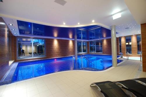 Imagen de la piscina del Hotel Puchacz Spa. Foto 8