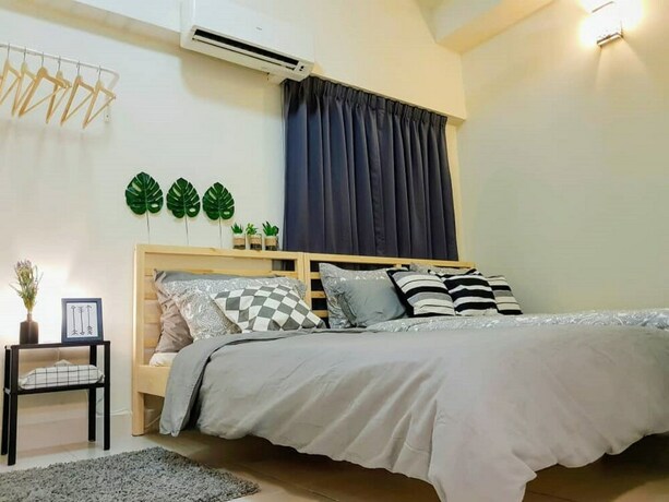 Imagen de la habitación del Hotel Puchong 8-12 pax Cozy Apartment IOI. Foto 4