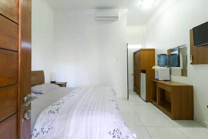 Imagen de la habitación del Hotel Pudak Sari Homestay. Foto 17
