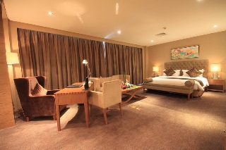 Imagen de la habitación del Hotel Pudong International Talent City Hotel. Foto 11