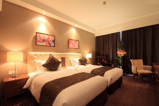 Imagen de la habitación del Hotel Pudong International Talent City Hotel. Foto 12