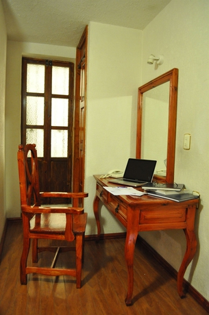 Imagen de la habitación del Hotel Puebla Plaza. Foto 7