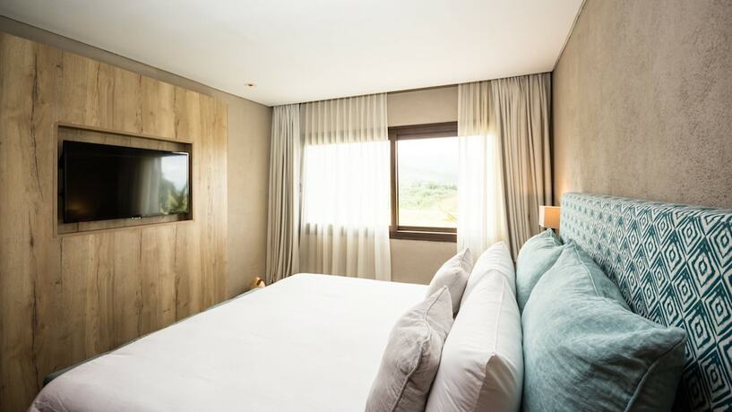 Imagen de la habitación del Hotel Pueblo Nativo Resort and Golf Spa. Foto 19