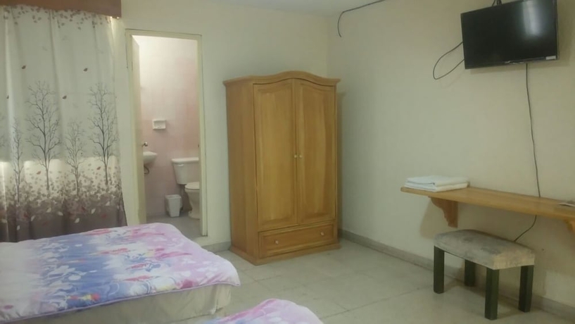 Imagen de la habitación del Hotel Puente Inn. Foto 7