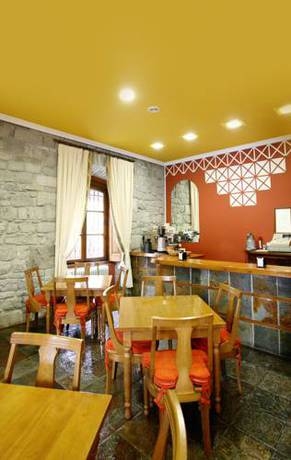 Imagen del bar/restaurante del Hotel Puente Romano, Cangas de On&iacute;s. Foto 4