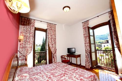 Imagen de la habitación del Hotel Puente Romano, Cangas de Onis. Foto 10