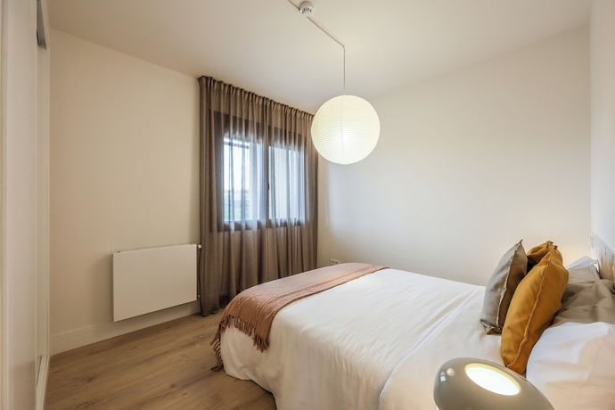 Imagen de la habitación del Hotel Puente de Segovia. Foto 8