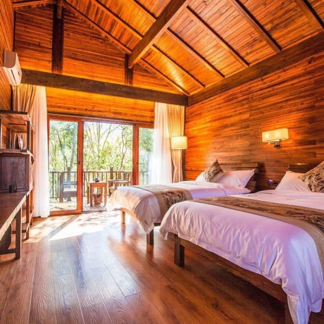 Imagen de la habitación del Hotel Puer Redpanda Manor. Foto 5