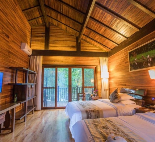 Imagen de la habitación del Hotel Puer Redpanda Manor. Foto 6