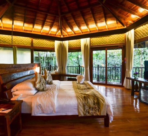 Imagen de la habitación del Hotel Puer Redpanda Manor. Foto 7