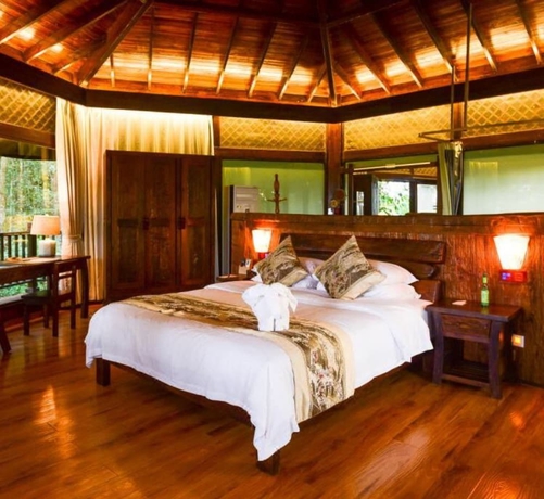 Imagen de la habitación del Hotel Puer Redpanda Manor. Foto 8