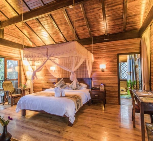 Imagen de la habitación del Hotel Puer Redpanda Manor. Foto 9