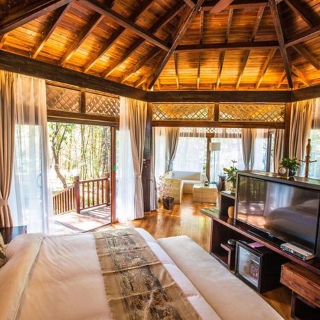 Imagen de la habitación del Hotel Puer Redpanda Manor. Foto 11