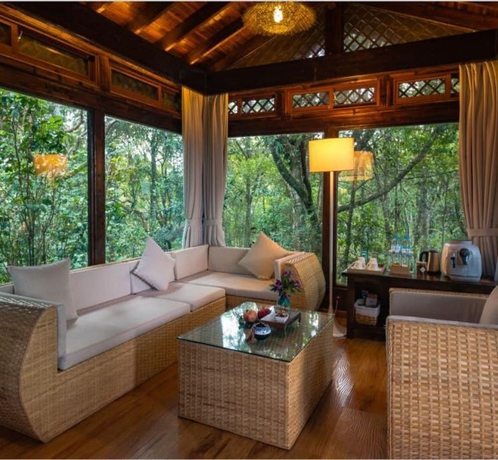 Imagen de la habitación del Hotel Puer Redpanda Manor. Foto 12