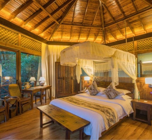 Imagen de la habitación del Hotel Puer Redpanda Manor. Foto 13