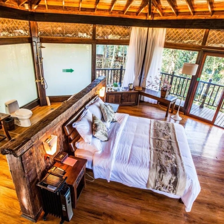 Imagen de la habitación del Hotel Puer Redpanda Manor. Foto 14