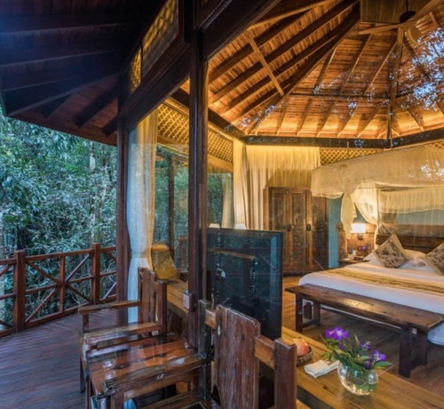 Imagen de la habitación del Hotel Puer Redpanda Manor. Foto 15