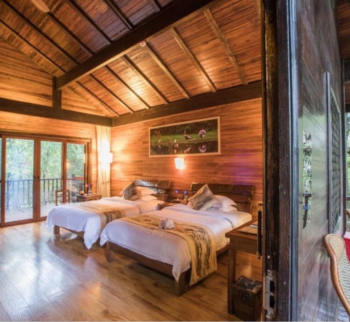 Imagen de la habitación del Hotel Puer Redpanda Manor. Foto 16