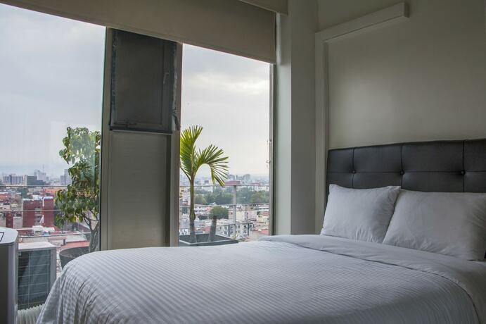 Imagen general del Hotel Puerta Alameda Suites, Ciudad de M&eacute;xico. Foto 7