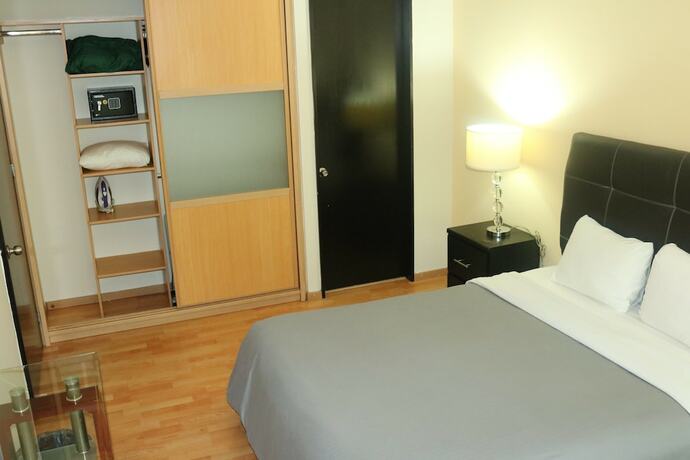 Imagen de la habitación del Hotel Puerta Alameda Suites, Ciudad de M&eacute;xico. Foto 11