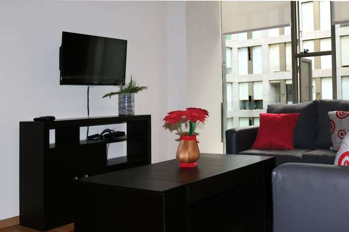 Imagen de la habitación del Hotel Puerta Alameda Suites, Ciudad de M&eacute;xico. Foto 14