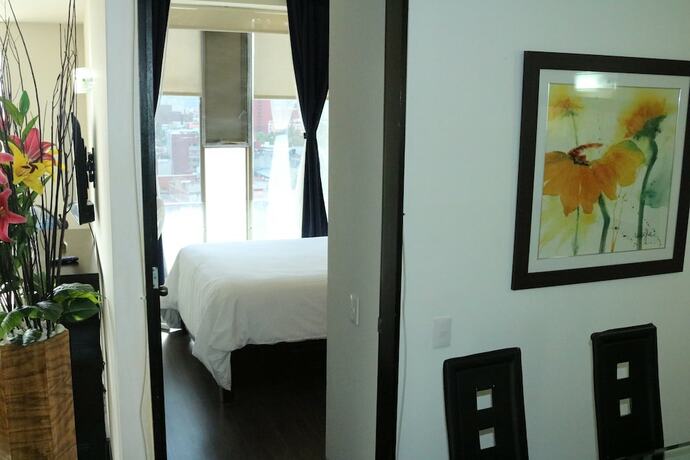 Imagen de la habitación del Hotel Puerta Alameda Suites, Ciudad de M&eacute;xico. Foto 20