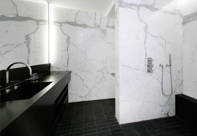 Imagen de la habitación del Hotel Puerta América. Foto 10