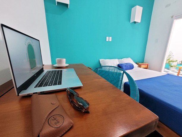Imagen de la habitación del Hotel Puerta Aqua Hostel. Foto 10