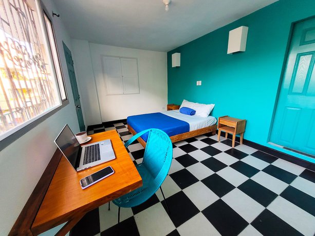 Imagen de la habitación del Hotel Puerta Aqua Hostel. Foto 19