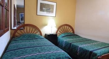 Imagen de la habitación del Hotel Puerta Blanca Guesthouse. Foto 6