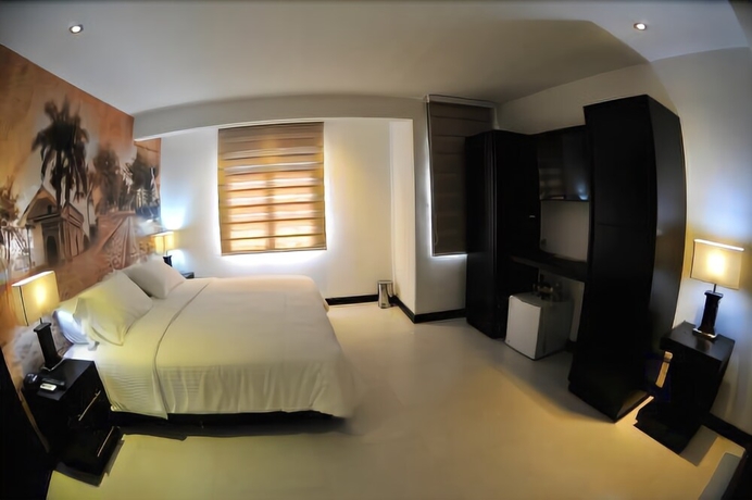 Imagen de la habitación del Hotel Puerta De San Antonio. Foto 11