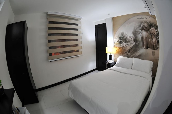 Imagen de la habitación del Hotel Puerta De San Antonio. Foto 13