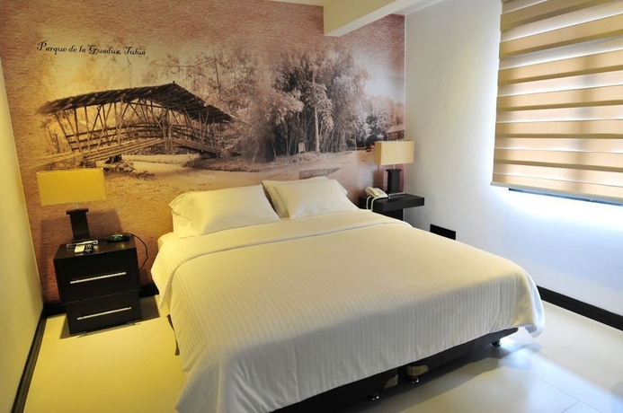 Imagen de la habitación del Hotel Puerta De San Antonio. Foto 15