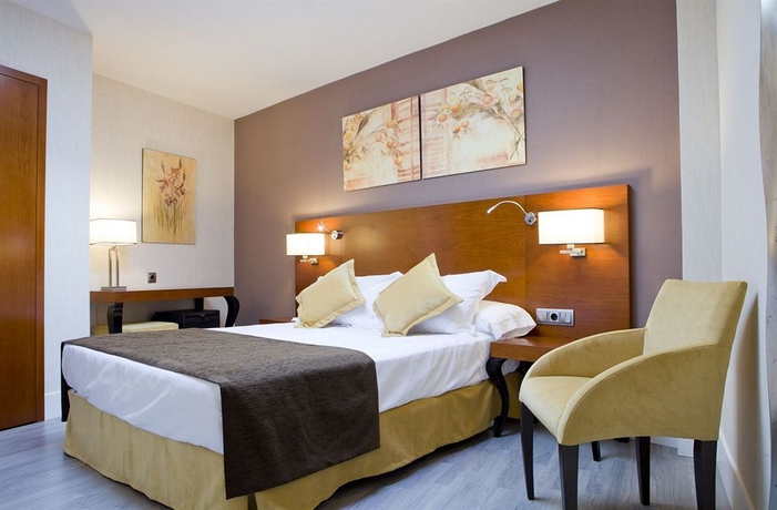 Imagen de la habitación del Hotel Puerta De Toledo. Foto 5