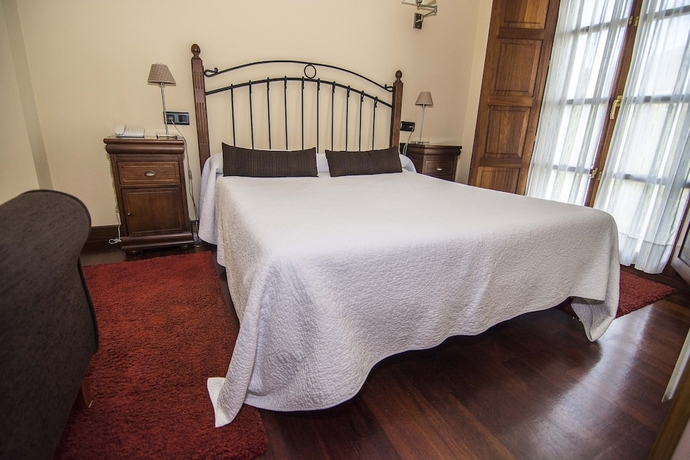 Imagen de la habitación del Hotel Puerta Del Oriente. Foto 10