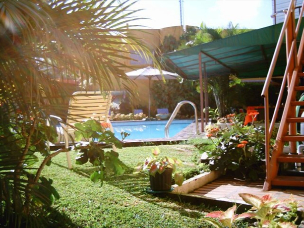 Imagen de la piscina del Hotel Puerta Del Sol, Cariari. Foto 13